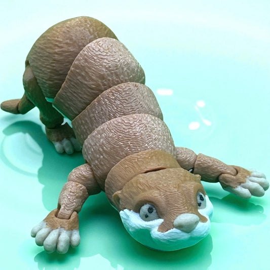 Articulated Otter Figurine