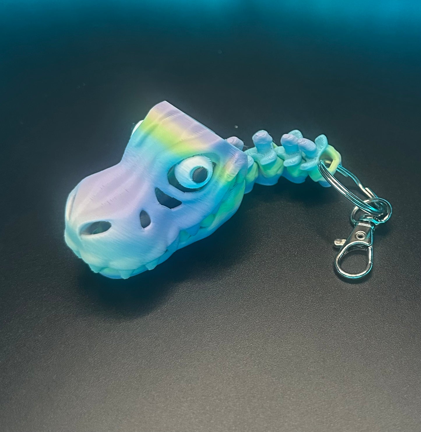 Pastel Rainbow Dino Skeleton Head Keyring